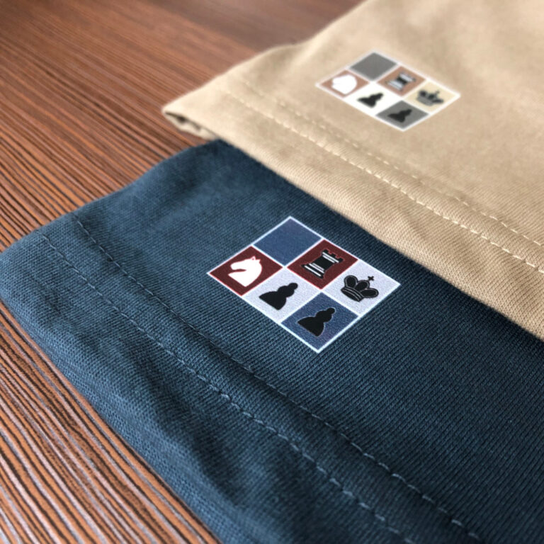 brown and blue Philidor decorations on the Classic Philidor T-shirts by Smothered Mate